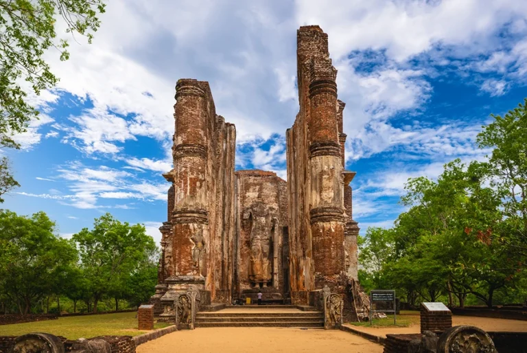 Remains of the centuries-old royal palace in Polonnaruwa, Sri Lanka, with ancient brick walls and pillars under the open sky